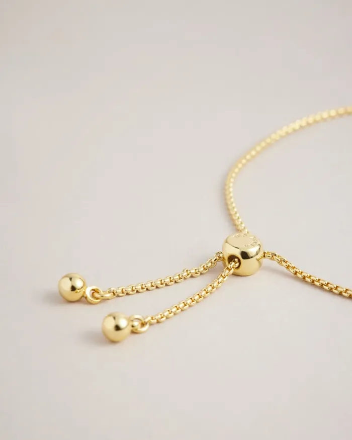 Women SARSAA 8211 Crystal Charm Bracelet Gold Colour Ted Baker Jewellery